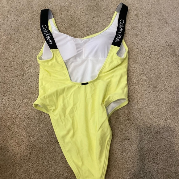 Calvin Klein, One piece swimsuit. 

￼ - Picture 1 of 4